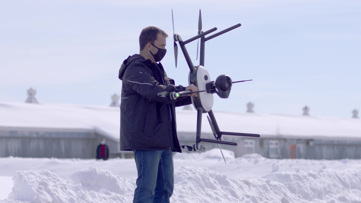 a person holding drone