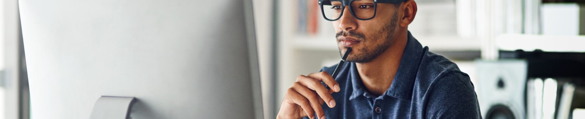 man in front of a computer