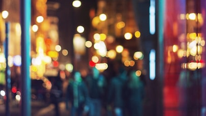 A blurry image of colourful city lights.