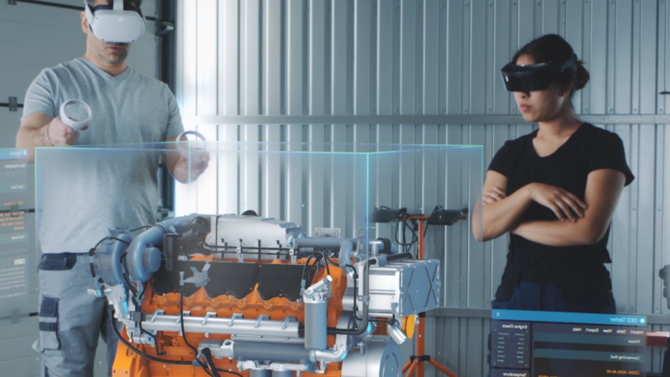 An image of two people wearing VR headsets.