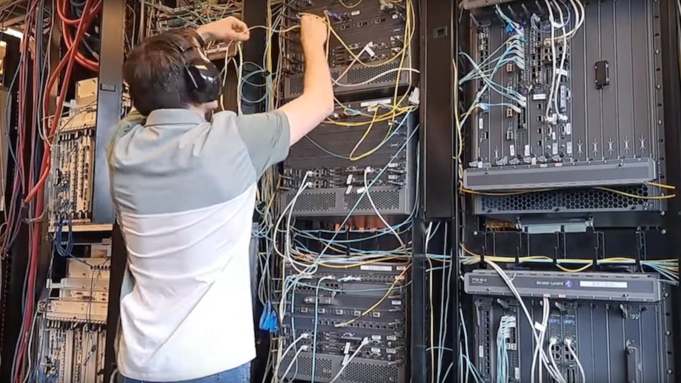 A summer intern working on servers.