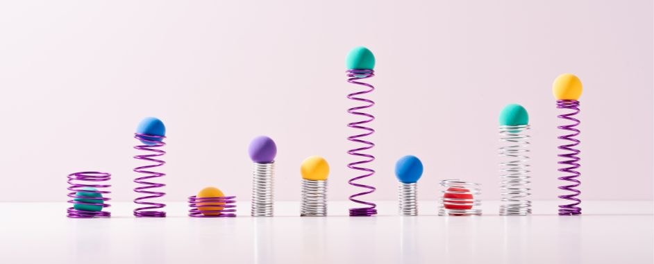 Springs with colorful balls on top of them