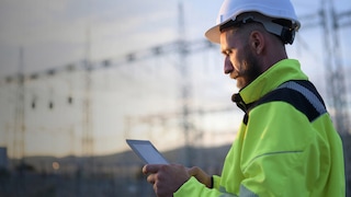 Engineer in hi-viz jacket at power station
