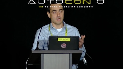 Igor Giangrossi giving a speech at Autocon, a Network automation conference.