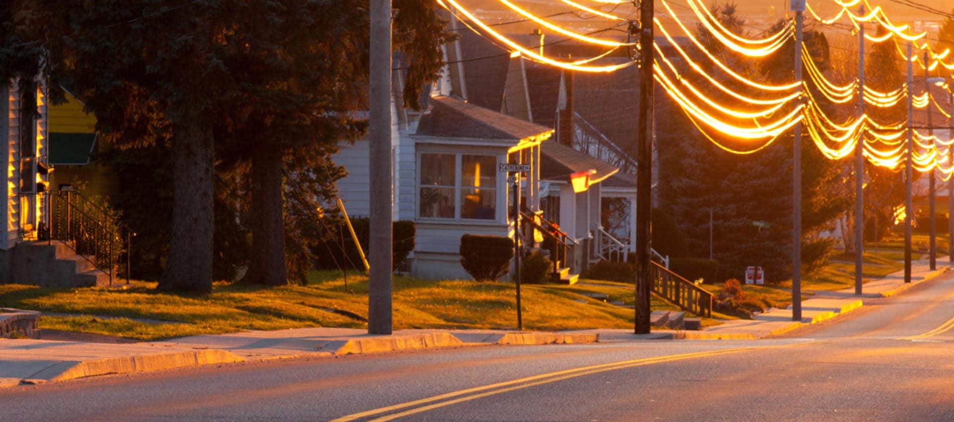 a suburban street with power lines