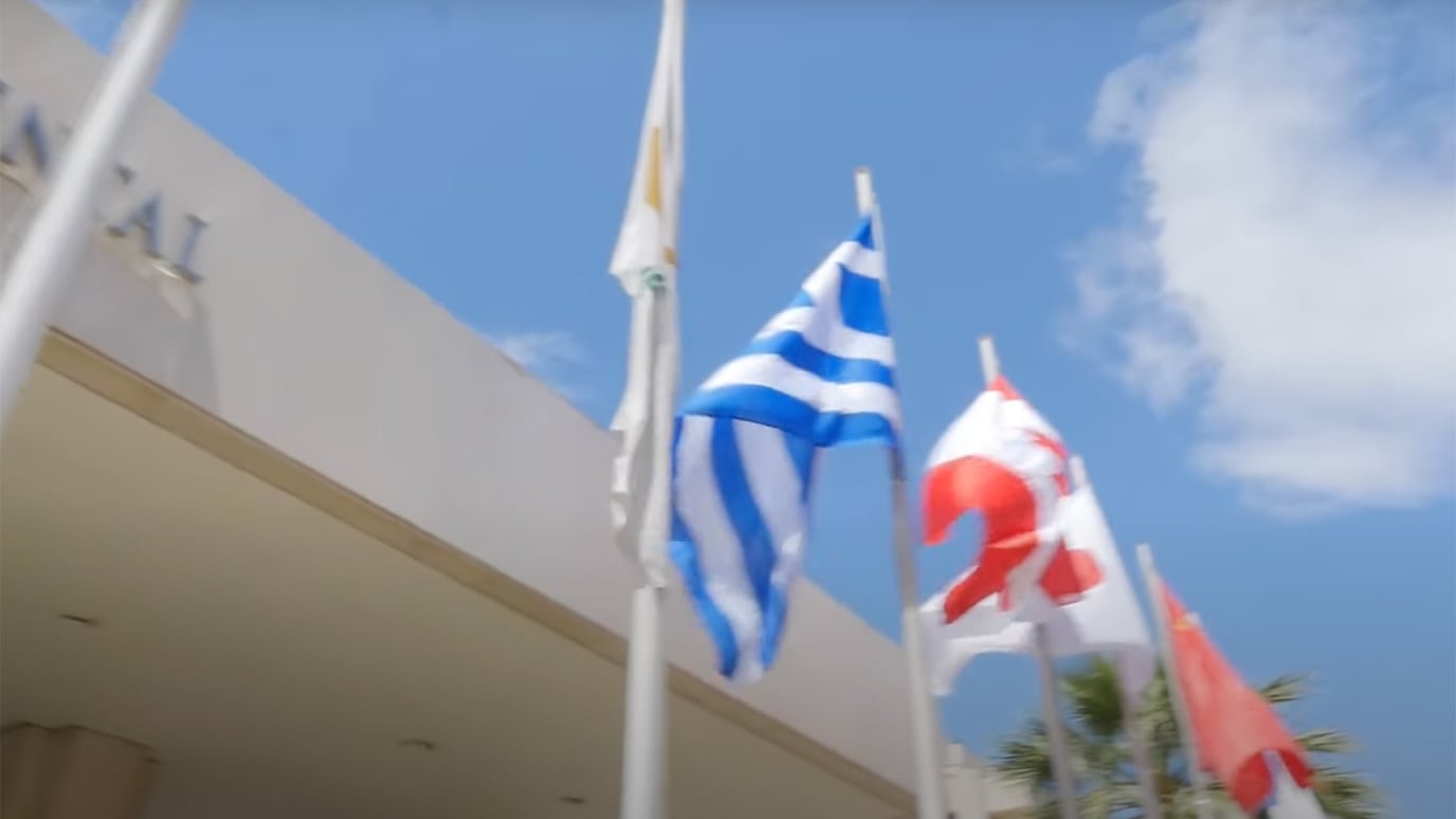Flags flying in front of hotel