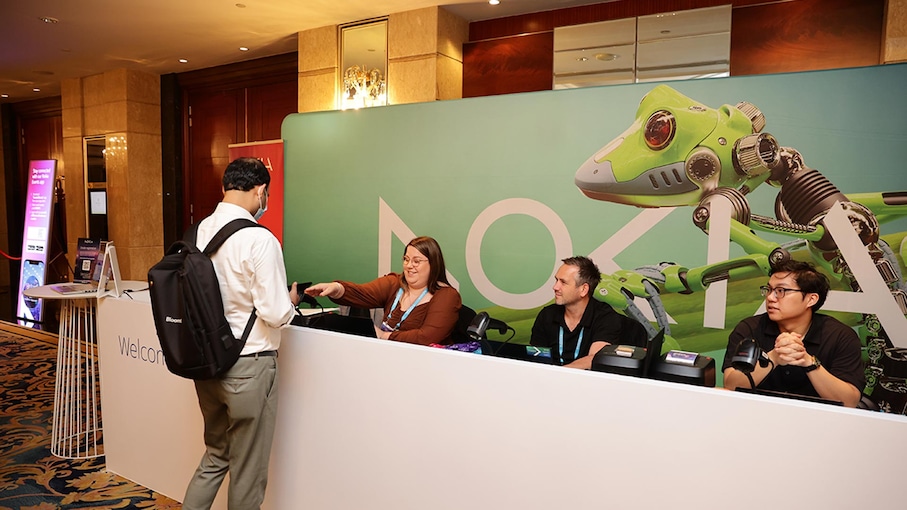 Guest checking in at reception desk
