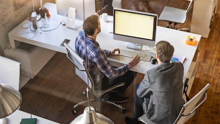 Two entrepreneurs working on their idea.