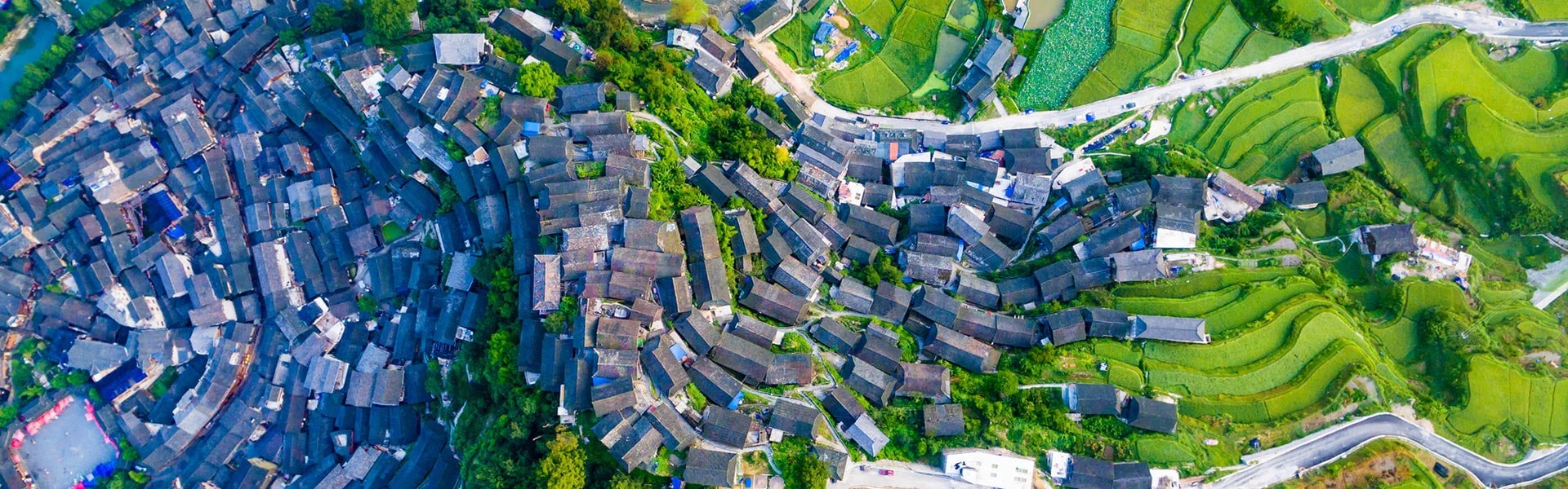 Overhead view of town on hilly terrain
