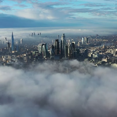 City seen beyond clouds