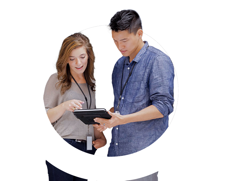 Woman and man looking at tablet device