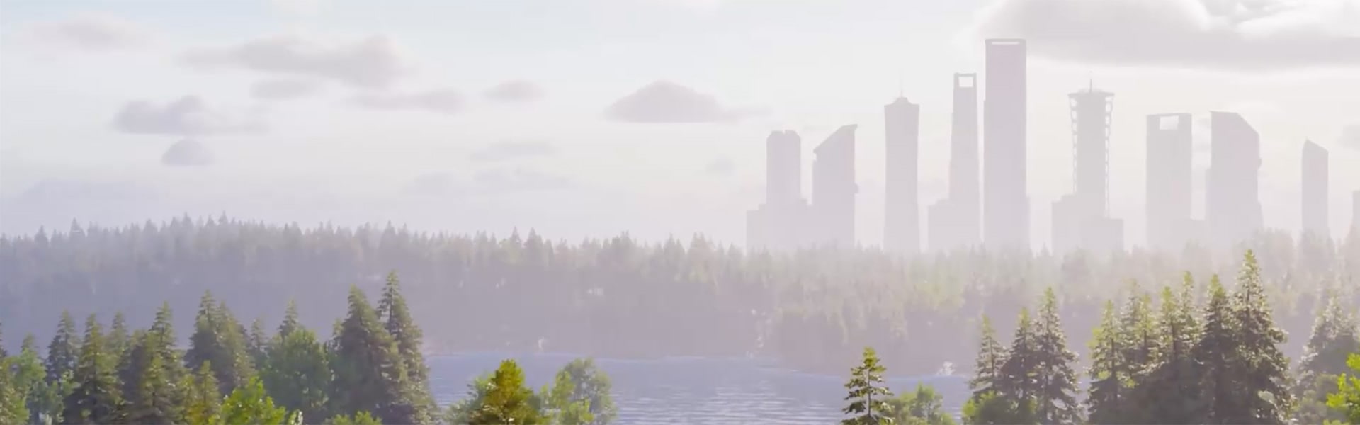 Silhouette of city towers in distance with lake and forest in foreground
