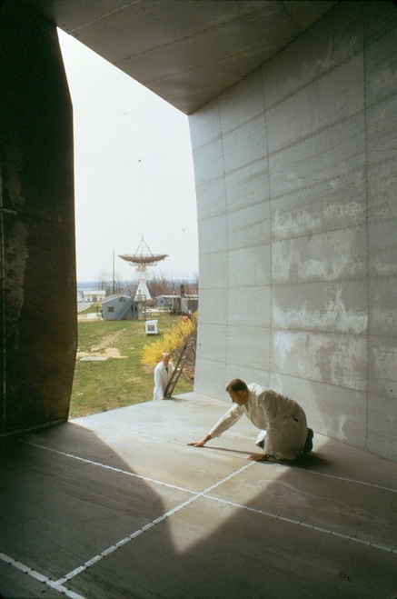 Penzias & Wilson working on the antenna