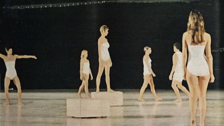 Dancers perform Deborah Hay’s “Solo.” The dancers interacted with eight radio-controlled moving platforms that moved around the floor