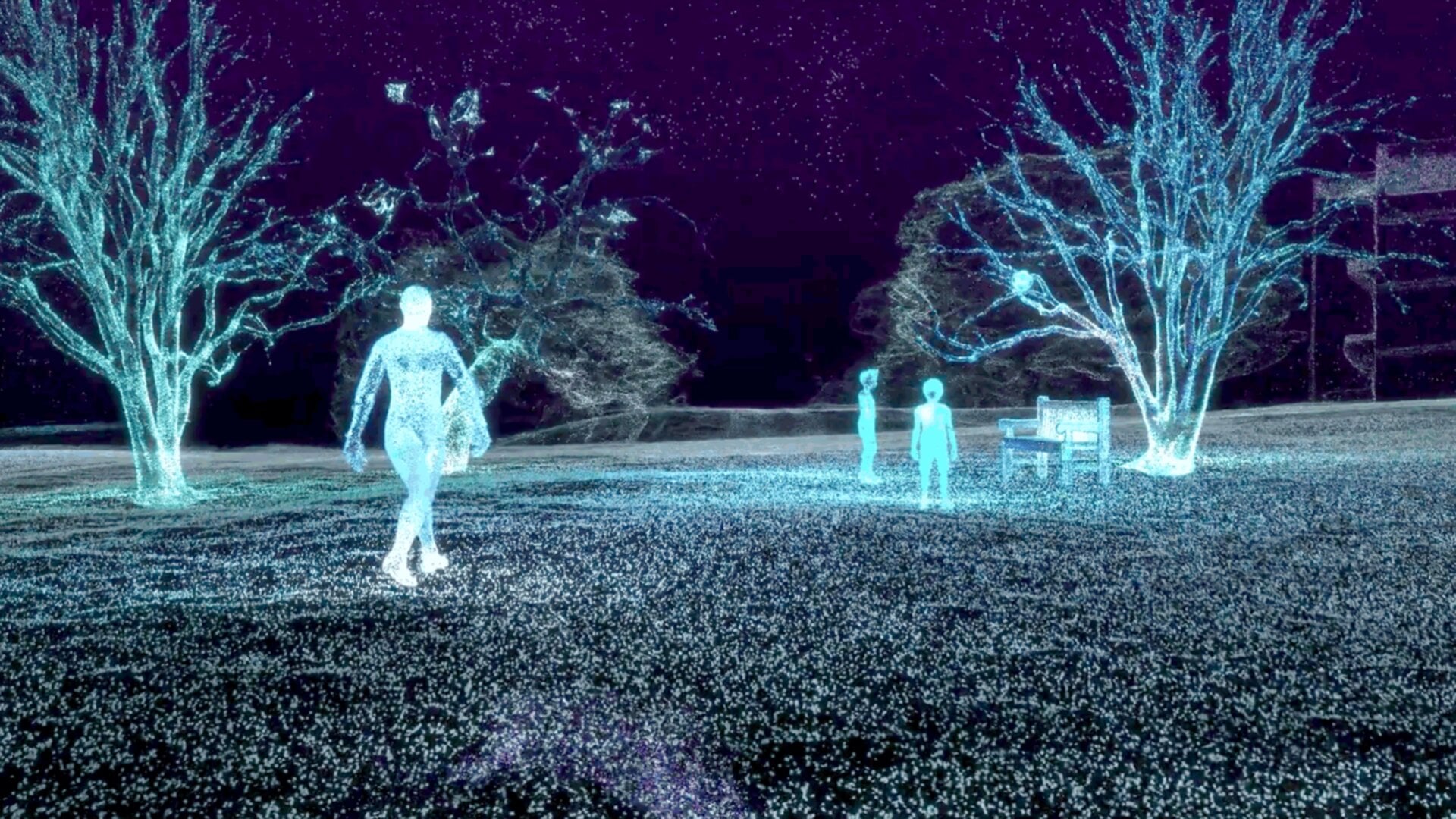 A digital rendering of a park at night with three people walking through the grass. The people and trees are made up of glowing blue dots.