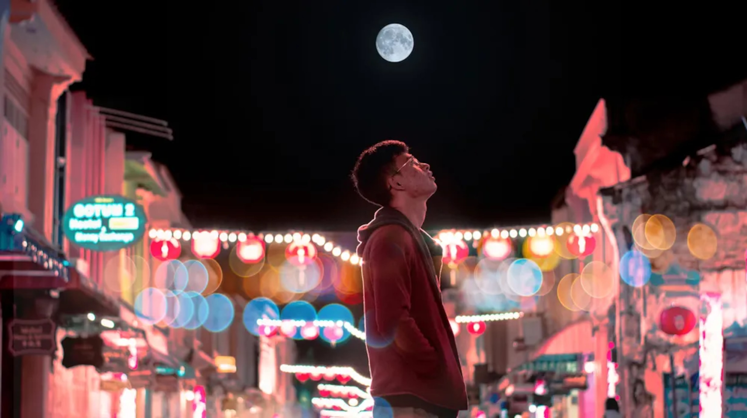 Man looking at the Moon