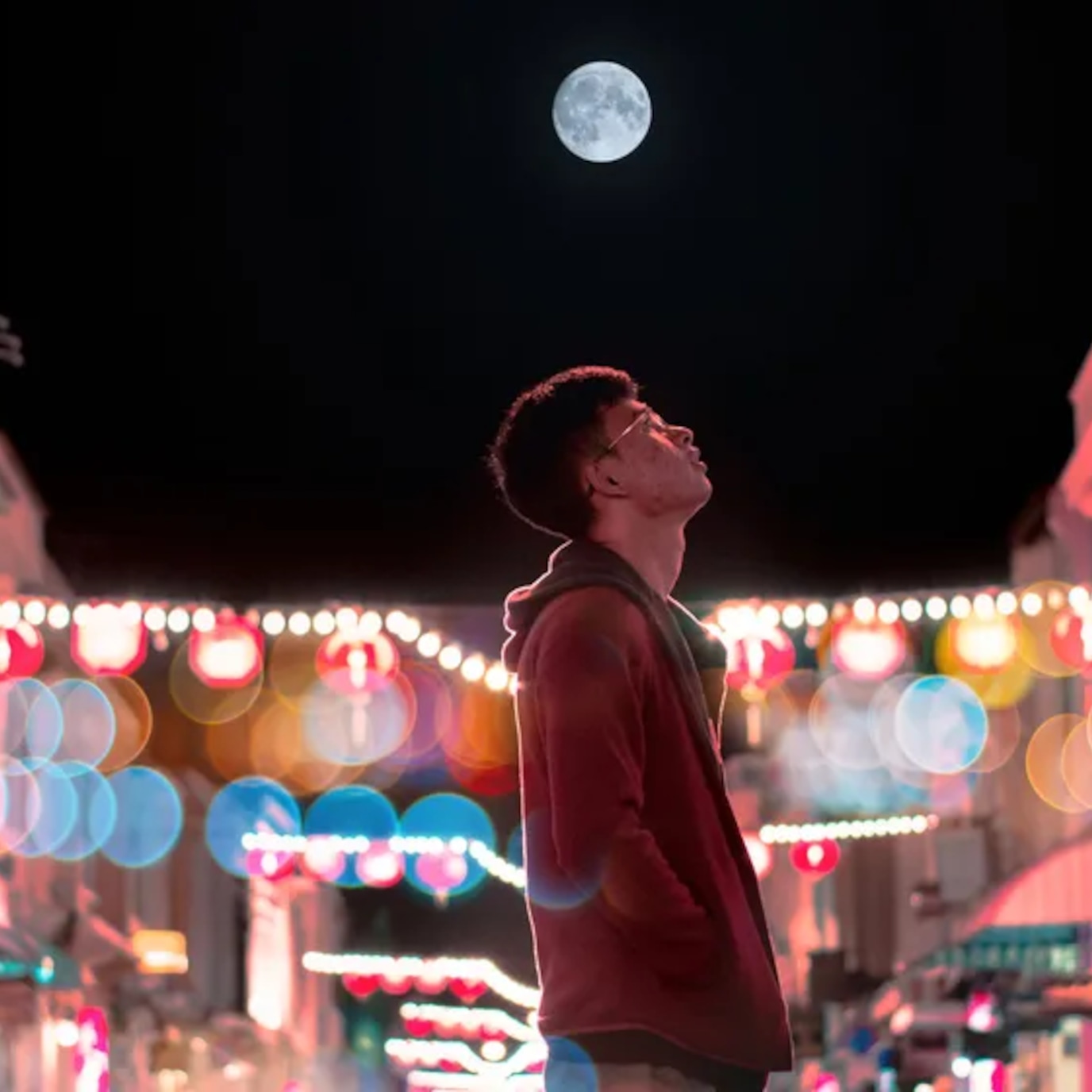 Man looking at the Moon