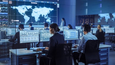 Workers in control room