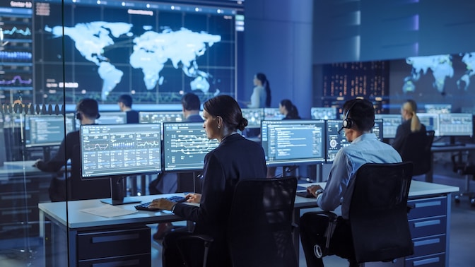 Workers in control room