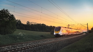 evening sky and running train
