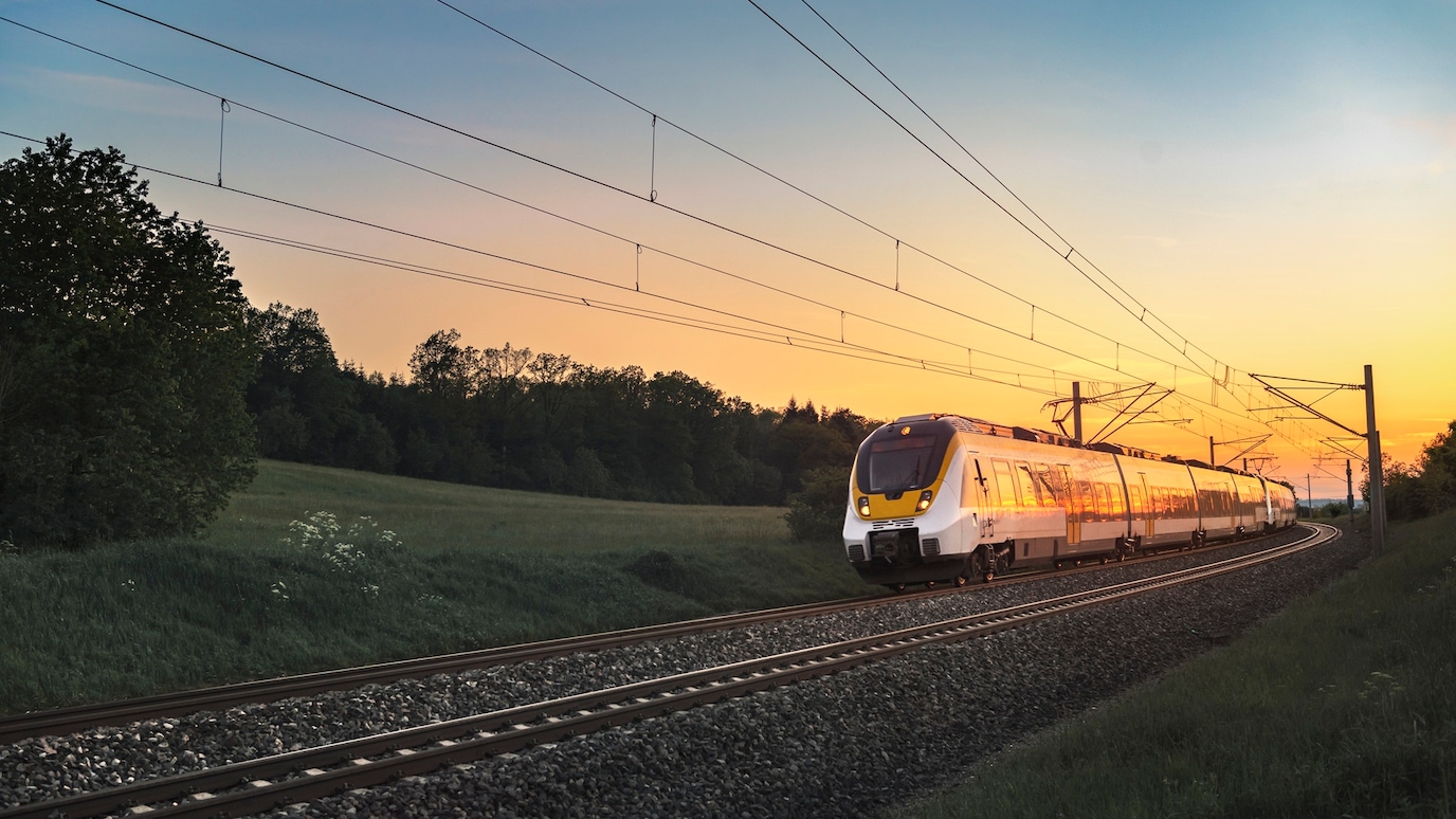 evening sky and running train