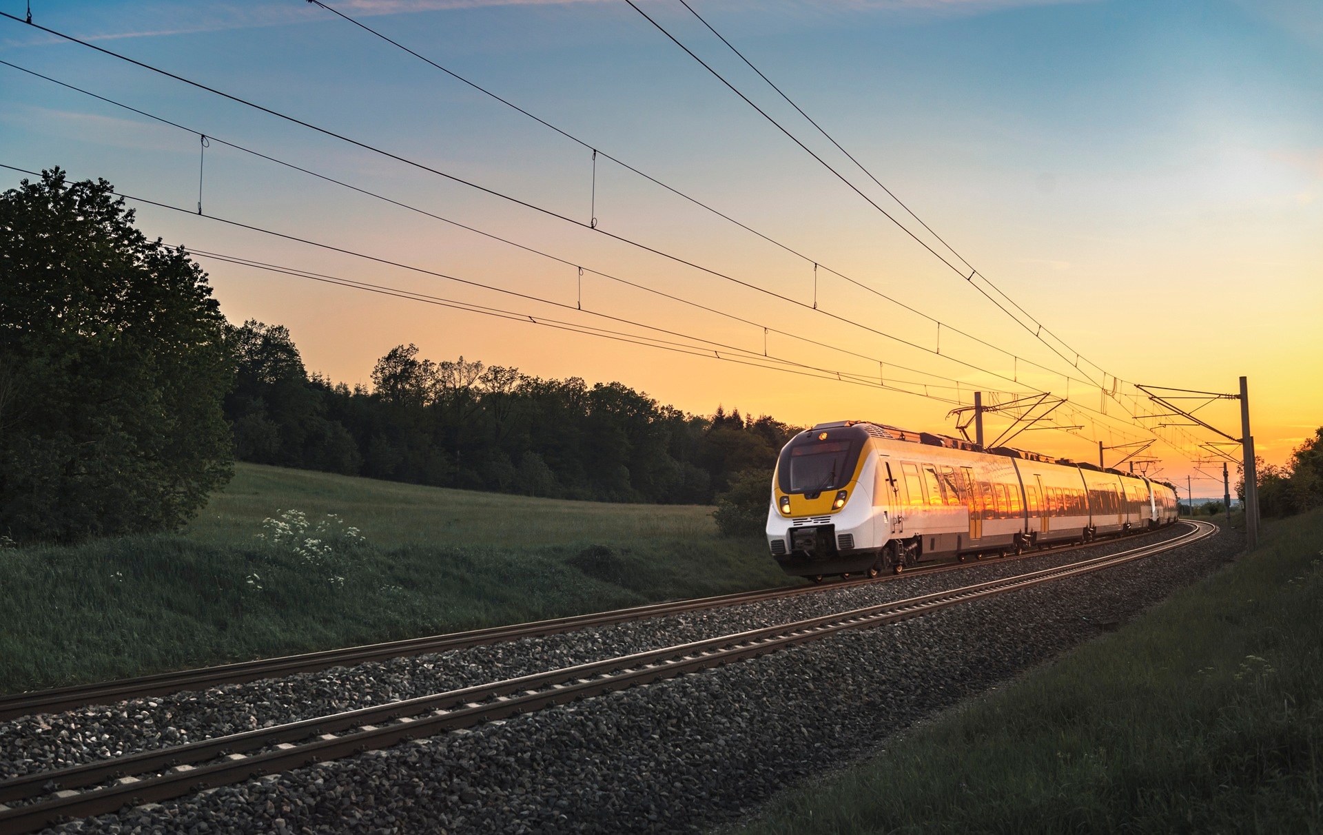 evening sky and running train
