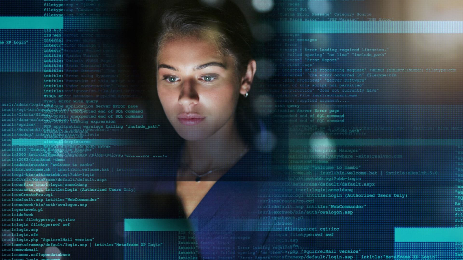 A young cybersecurity expert is looking at the computer screen, searching for DDoS patterns