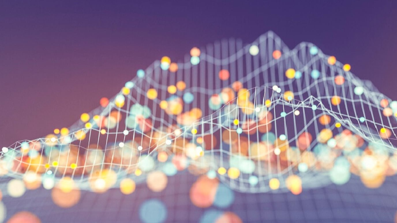 Abstract 3D data visualization with colorful dots and a wavy grid, representing sound waves..