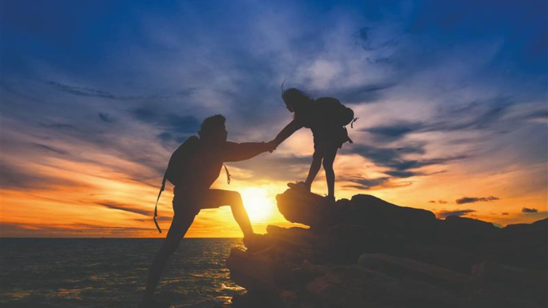 Hikers at sunset