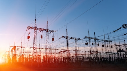 Electricity pylons at sunset