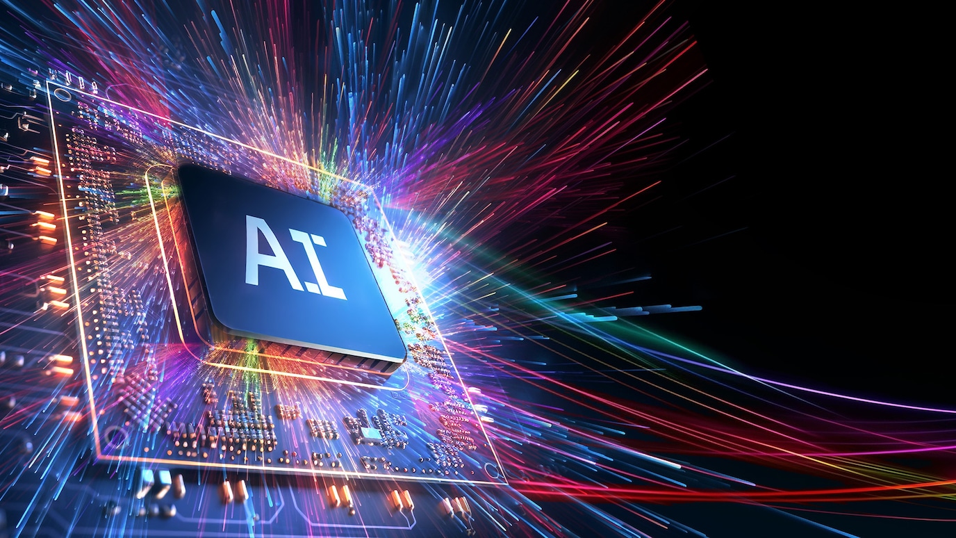 Silicon chip marked 'AI' on circuit baord