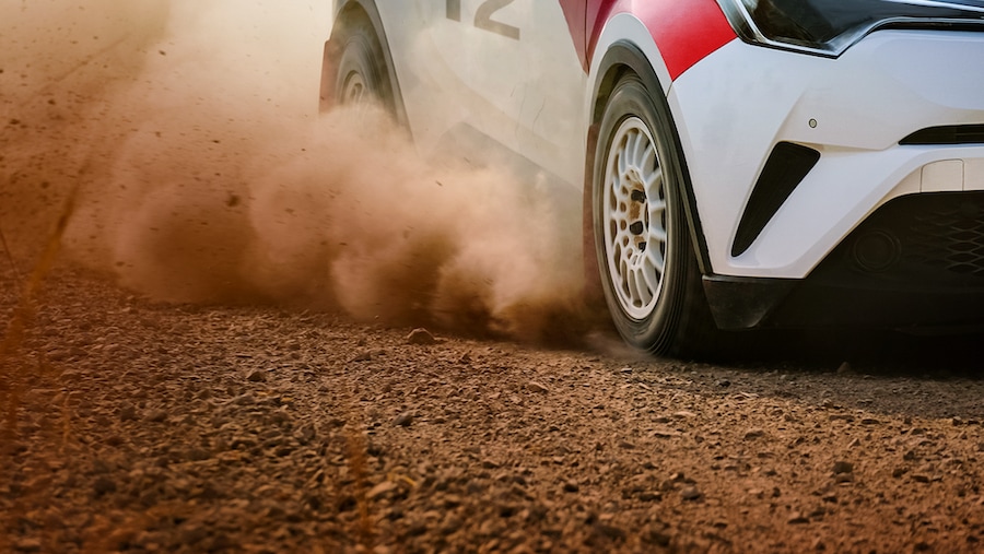 Race car on a dusty road