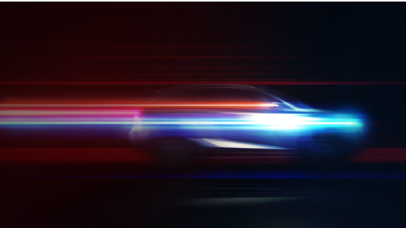 Blurred fast-moving car with neon light trails, symbolizing speed, cybersecurity threats, and evolving digital DDoS attack concepts.