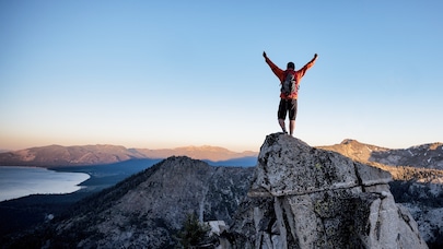 man on the top of hill