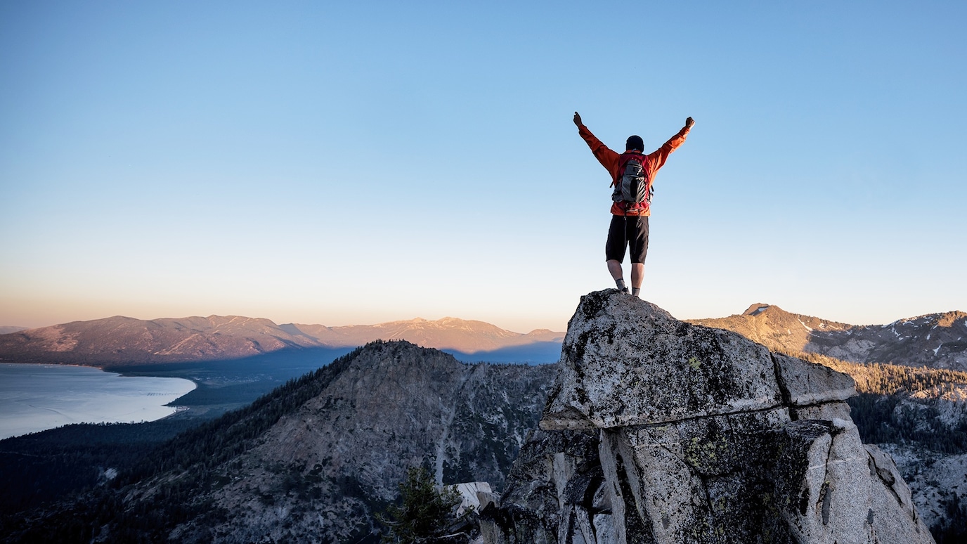 man on the top of hill