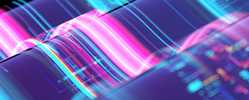 Abstract image of colorful light waves and data patterns symbolizing high-speed optical transport technology.