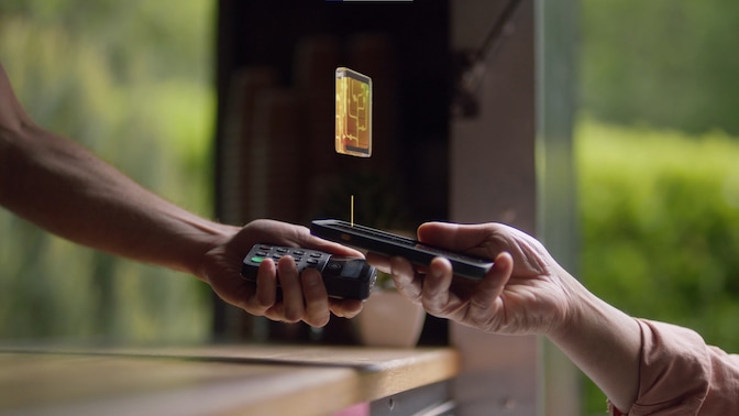 People tapping two smartphones together to exchange data