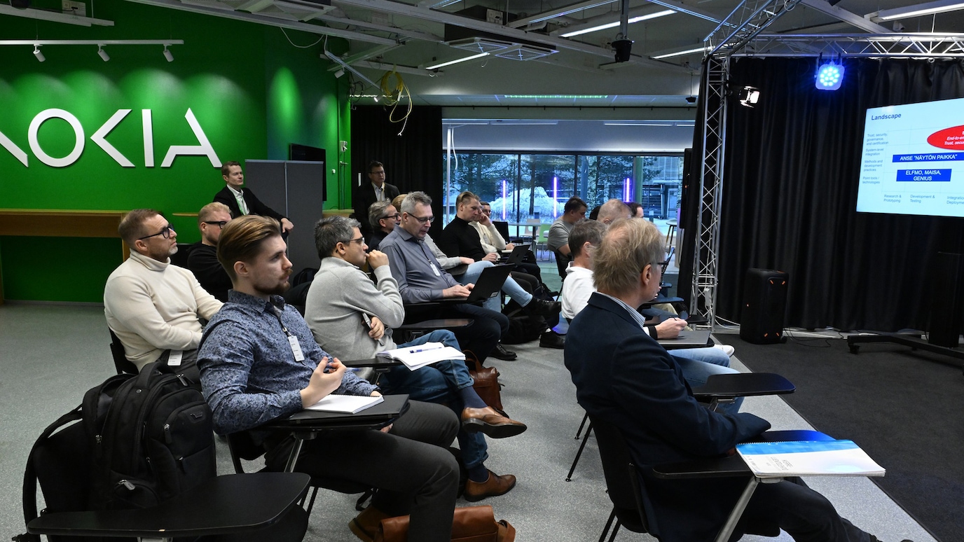 Meeting participants watching presentation
