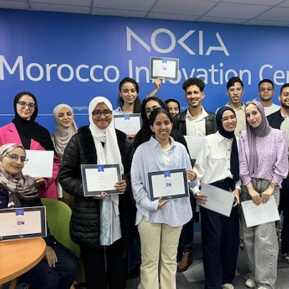 A group of employees holding certifications