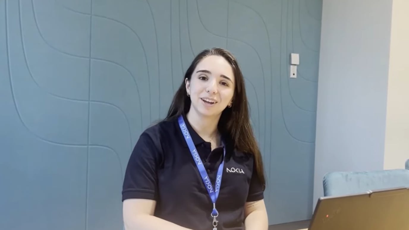 A nokia employee smiling 