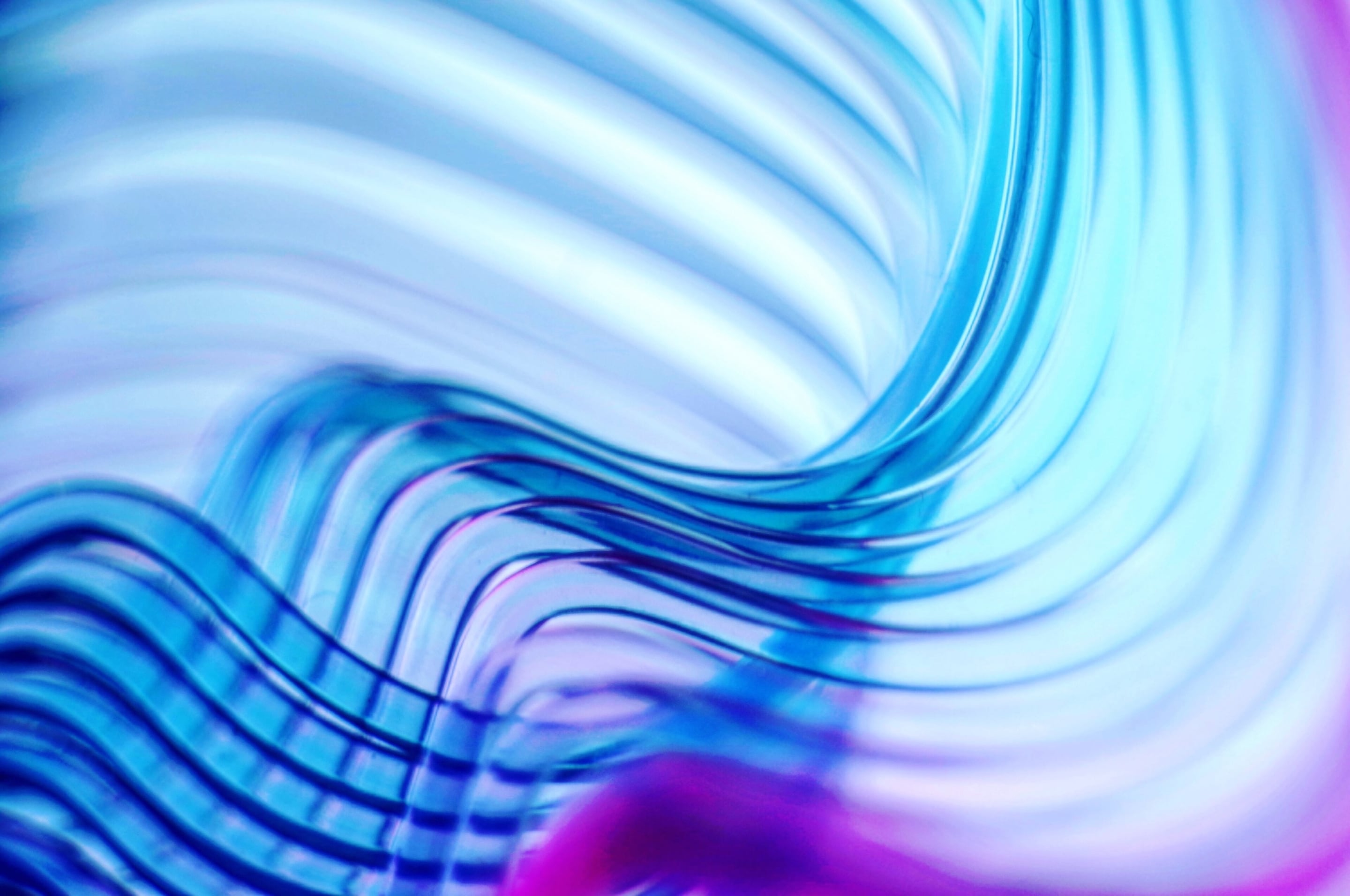 Abstract blue and purple flowing waves with gradients and fluid motion background
