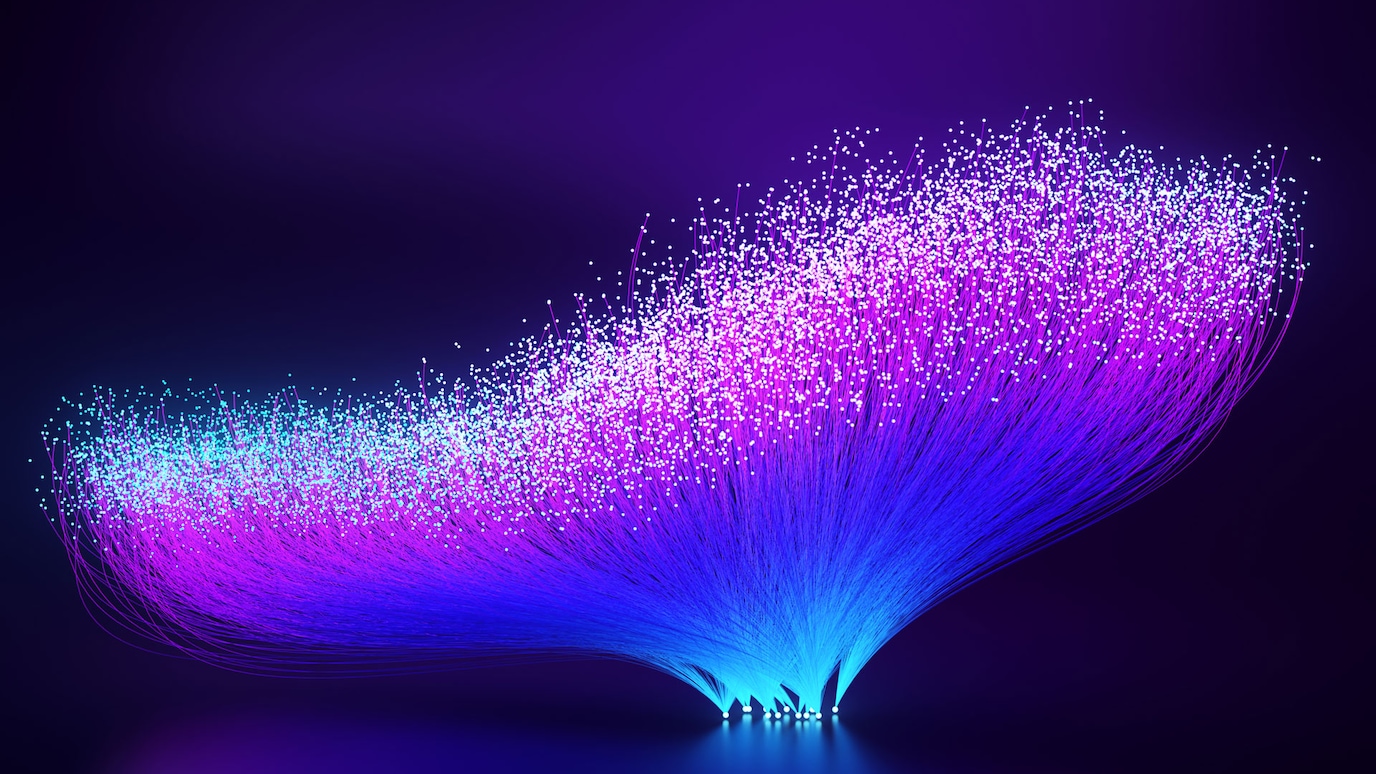 Lit fibre optic cables fanned out like a fishtail