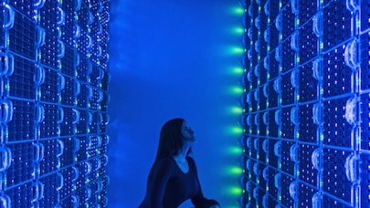 women looking at data center
