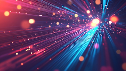 Abstract neon light streaks and glowing particles creating dynamic futuristic motion background