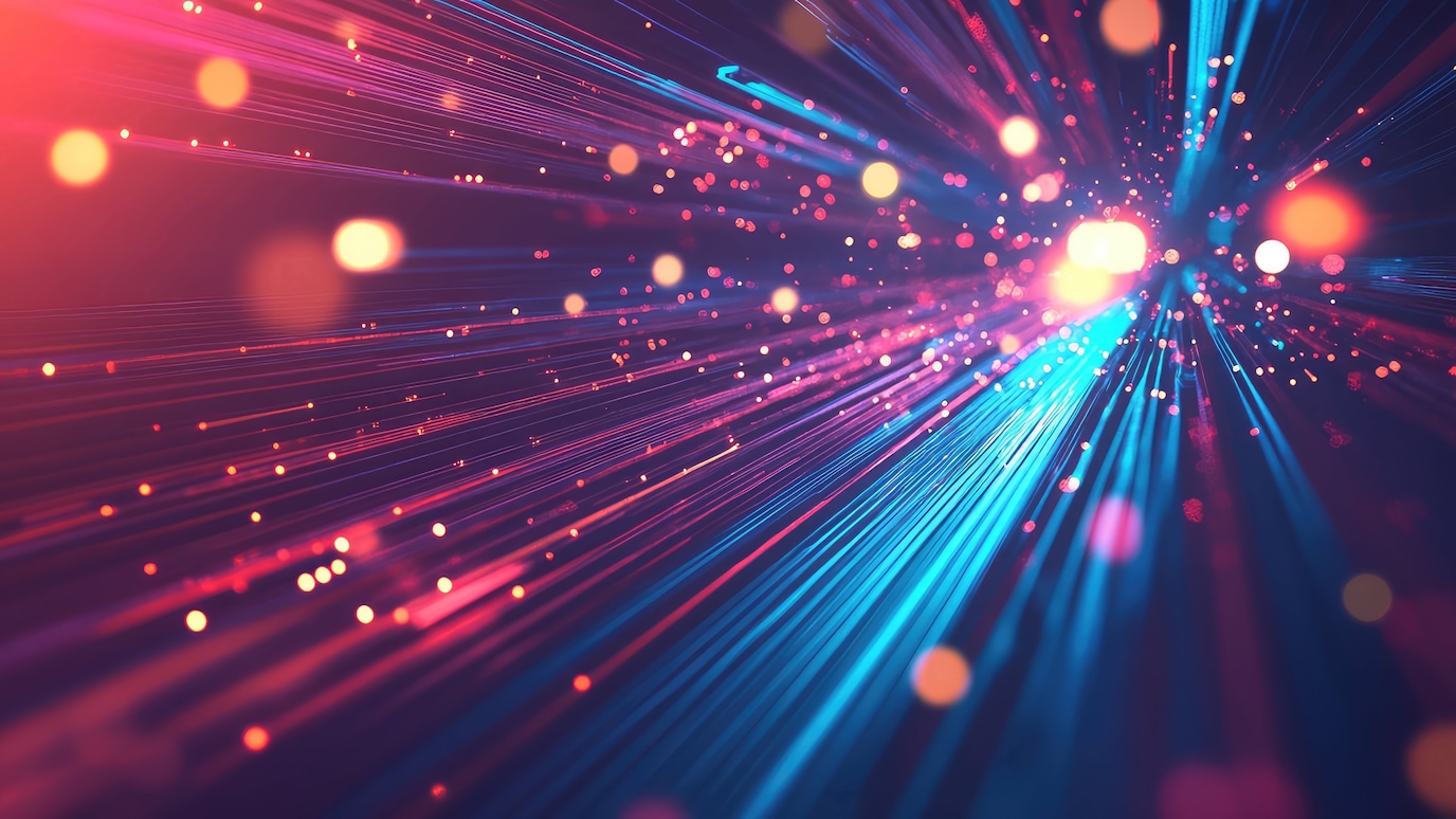 Abstract neon light streaks and glowing particles creating dynamic futuristic motion background