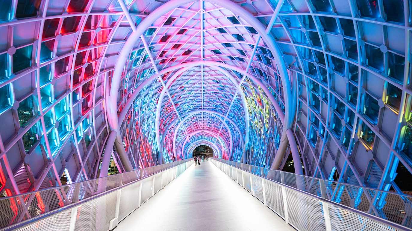 Bridge leading to multicoloured tunnel