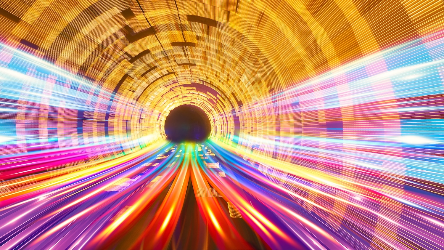 Abstract tunnel of colorful data streams rushing toward a dark center, symbolizing high-speed digital connectivity.