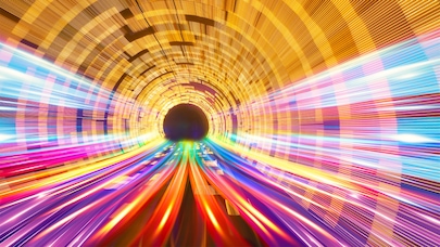 Abstract tunnel of colorful data streams rushing toward a dark center, symbolizing high-speed digital connectivity.