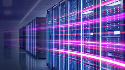 Server rack cabinets connected by trailers of light