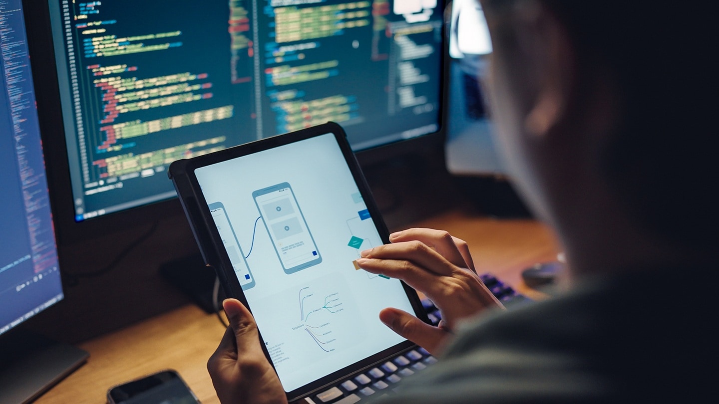 man working on tablet